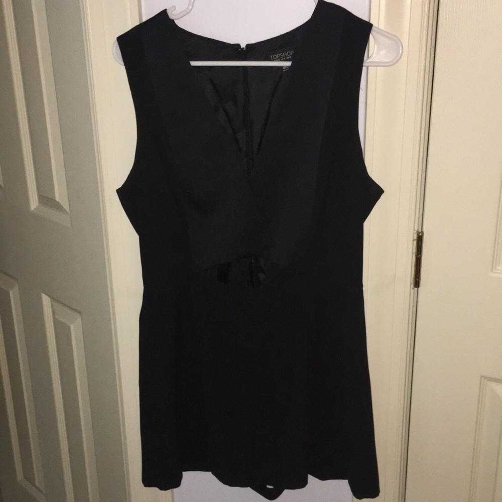 Top shop black romper with front cutout. Size 8